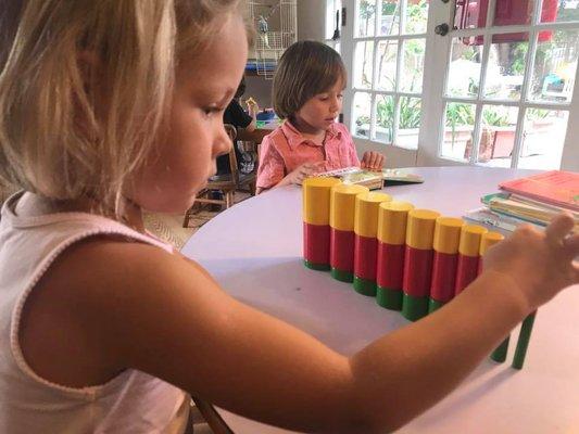 Maria working with Knobless Cylinders! Sometimes there will be classical or relaxing music in the background when we drop her off.