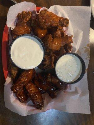 12 traditional wings. Buffalo and Sriracha Bourbon.