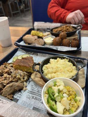 Brisket platter w/ baked beans & hushpuppies NC pulled pork platter w/ Mac n cheese & street corn salad