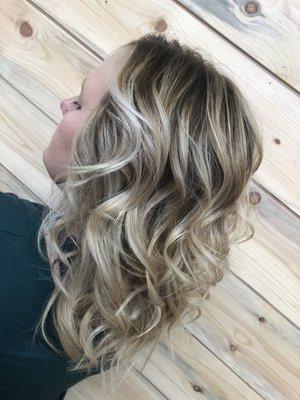 Balayage/ Foiliage technique used here. Results in a gorgeous Summer Blonde look!