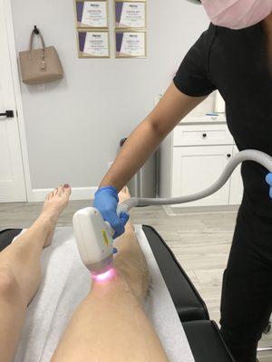 Getting laser hair removal with Eunice.