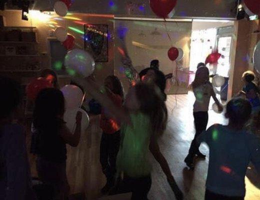 Dance party with disco lights and bubbles at Plaster Palace Pottery!