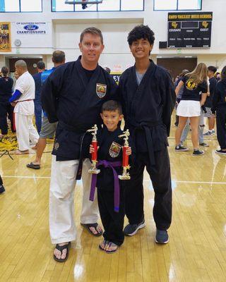 At Socal Karate Tournament. Won 2nd place in forms and sparring for his age range. With Sensei Andrew and Sensei Alejandro.