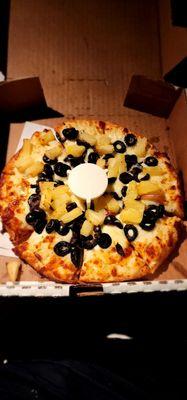 Black olives and pineapple with creamy garlic sauce.  Absolutely delicious!