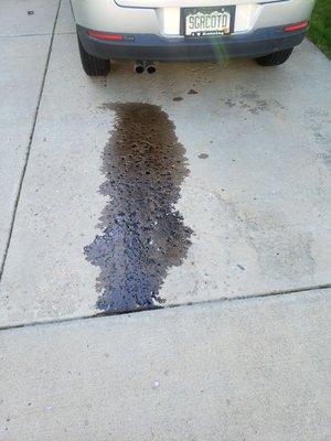 About 1/2 quart of oil staining my BFs driveway