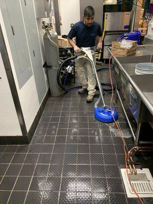 Kitchen floor pressure washing.