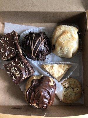 Chocolate peanut butter brownies, chocolate bomb, apple dumpling, baklava, coconut walnut cookie, chocolate cream puff