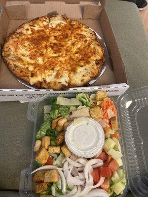 Buffalo chicken pizza and salad with ranch