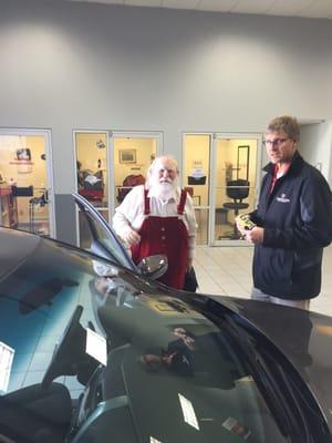 Guess who I ran into at the Nissan Dealership? Jolly old St Nick!!