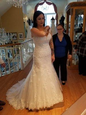 Sabrina helping the bride feel like a beautiful bride.