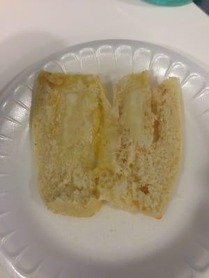 Stuffed cheese bread; this is NOT stuffed with cheese! Shame, shame shame! Charging $4 for what you DON'T give.