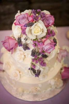 Our wedding cake made by Servatii (with added live roses.) Beautiful job!