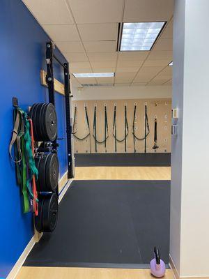 gym shot with weights, bands, yoga wall