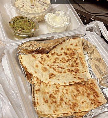 $17.58 for this cheese quesadilla "house specialty" with guac, sour cream, and a medium side.