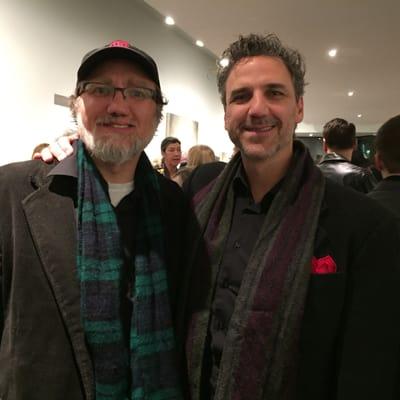 Nice time at the grand reopening last night. Here I am with Matt Kotlarczyk.  Jonathan Queens paintings were the star of the night.