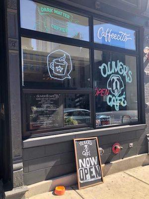 Front window with Oliver's Cafe logo (a Saint Bernard dog)