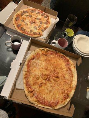 Sausage pizza and 2 large cheese pizzas