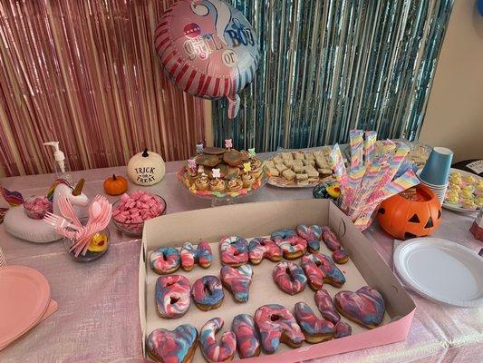 Custom made donuts for my gender reveal party. Love how they turned out! Not only they are pretty, they are so good! Loved the colors!