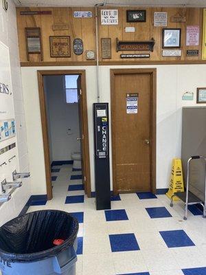 Bathroom along with change machine.