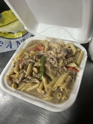 Rasta pasta with jerk chicken.