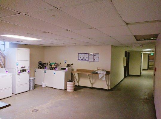 Laundry room of the Marleigh. Has washers and dryers that use debit/credit cards rather than coins.