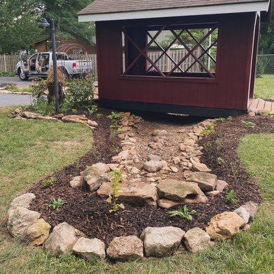 Dry river bed habitat garden.