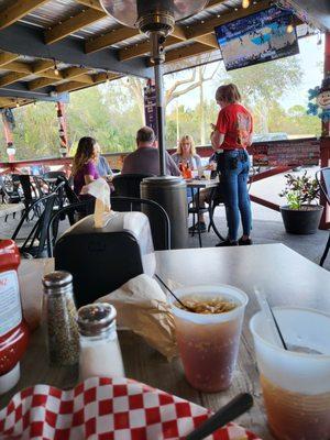 This waitress was training a waiter and stood at this table for 20 minutes chit-chating with her friends.