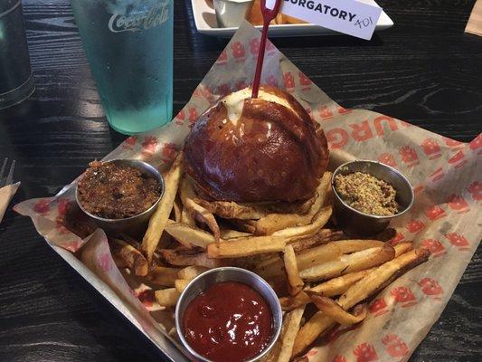 This burger didn't have a chance!! Bacon jam, whole grain mustard, cage free beef and topped it off with a warm soft pretzel bun!! Nom nom!!