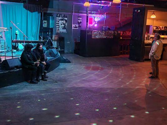 Preshow setup.  No chairs except for the bar and some "steps like" bleachers against the wall.