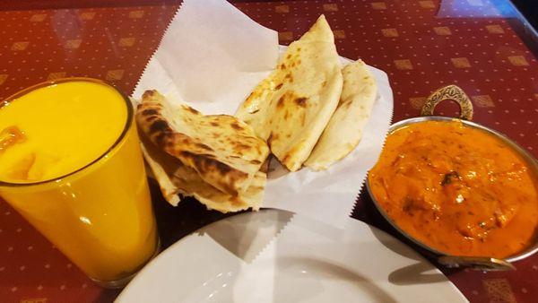 Mango lassi, plain naan, butter chicken (spice level 5).