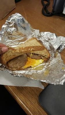 Breakfast sandwich. Multigrain bread, eggs, turkey sausage & cheddar cheese.