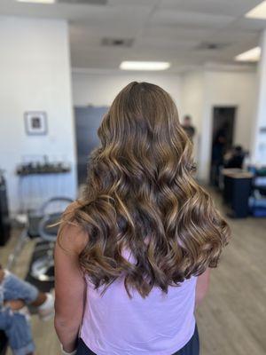 Long layers with a blowout and curling iron curls