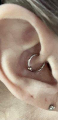 Daith piercing. I thought it would hurt more. Used to help migraines