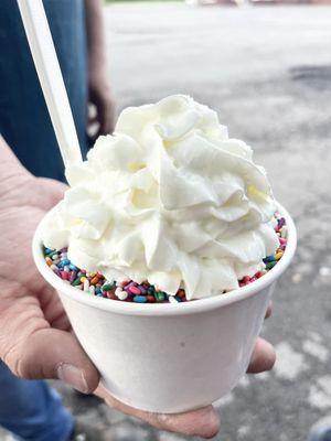 Vanilla twist with marshmallow topping, strawberries and rainbow sprinkles and whipped cream (my husband's)