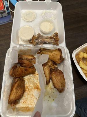 Half seasoned wings (Cajun on left, Lemmon pepper on right)