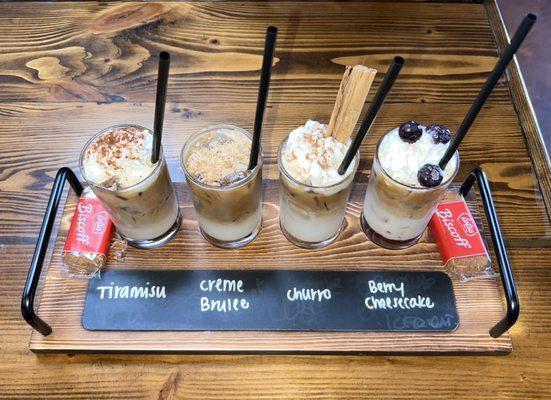 Speciality Coffee Flight: Tiramisu, Crème Brûlée, Churro, and Berry Cheesecake