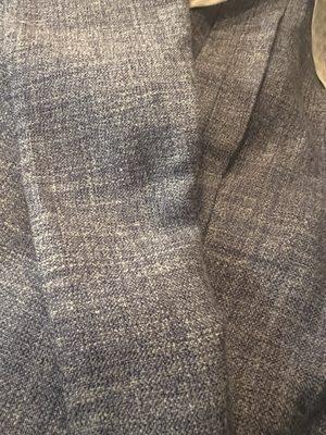 Messed up silk linen fabric on suit.