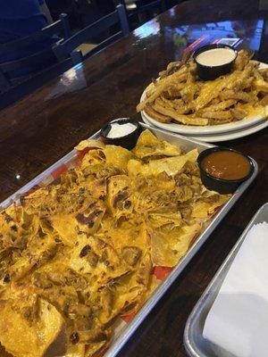 Nachos and cheese fries... Cooked well, can't you tell.