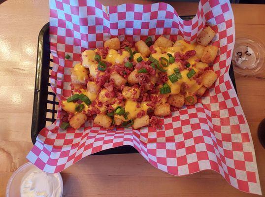 Loaded Irish nachos (tater tots) my friend had. (They said "loaded" means green onions, and regular is without the onions.)