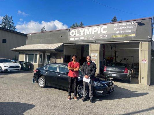 Peter and I with my first car purchase