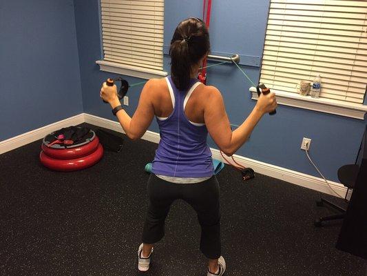 Strengthening back muscles with the reverse fly