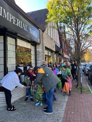 Halloween Parade in front of Imperial Nail