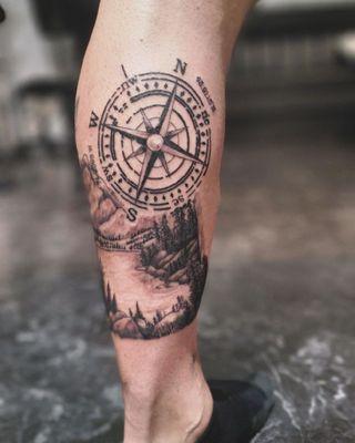 Mountain tattoo, compass tattoo
Tattoo artist Jerrie