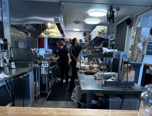 Bustling kitchen in rhythm slinging great food in little New Gretna! Well done, Boyz!