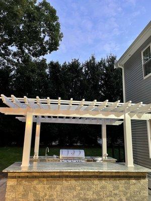 Vinyl pergola installed by OMA Fence