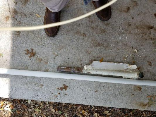 There's the removed pipe with drywall attached. Again... no cabinets were harmed in the removal of this pipe.