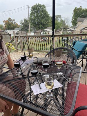 On the deck with our flights of wine