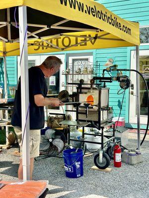 Fun glassblowing demo with a local studio  set up behind the shop.