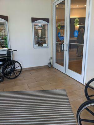 Entrance to inside of building equipped with readily to use wheel chairs