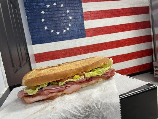 Ambub                   (Italian hoagie) Ham Salami Pepperoni Capicolla Provolone Lettuce Onion Tomato Hot pepper rings